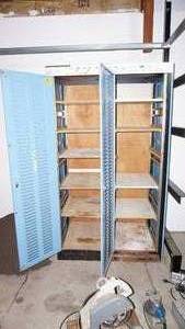lot 113 image: Eleven Shelf Storage Unit With Light Blue Doors---45 12 Wide  x  26 Deep  x  80 Tall