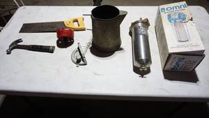 lot 114 image: Small Hand Saw- (Master Mechanic)--Hammer--Omni Regular Water Filter That Comes With Wrench & Cartridge--Vintage Aluminum Pitcher--