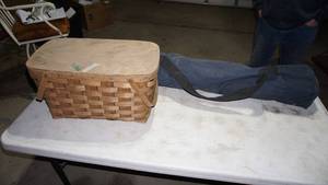 lot 122 image: Picnic Basket W 2 Handles By Basket Ville---A Portable Blue Foldable Denier Polyester Lawn Chair With Carrying Bag