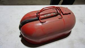 lot 128 image: A Red 2 12 Gallon Gas Tank For Outboard