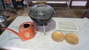 lot 134 image: Flower Watering Can--Two Wooden Trays--White Grill For On Floor Or Wall---A Weber Charcoal Table Grill