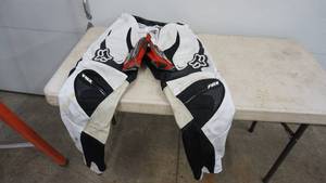 lot 150 image: FOX White & Black Motorcross Pants---A Pair Of Honda Gloves