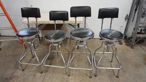 lot 144 image: Four Adjustable Stainless Steel Bar Stools With Black Padded Backs & Seats--(Craftsman Emblem On Seats)