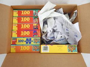 lot 14 image: Case of 7 Vintage Ace Ventura, Dumb and Dumber and USA Map According To Hoyle 100 Piece Puzzles