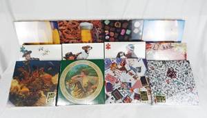 lot 15 image: Case of 12 Assorted Vintage Hoyle 550 Piece Puzzles