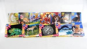 lot 23 image: Case of 12 Assorted Vintage According To Hoyle 100 Piece Puzzles