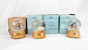 lot 97 image: Lot of 4 Vintage 1991 Norman Rockwell Downhill Daring Dave Grossman Creations Limited Edition Musical Waterglobes Snow Globes