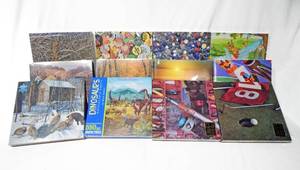 lot 139 image: Case of 12 Assorted Vintage Hoyle 550 Piece Puzzles