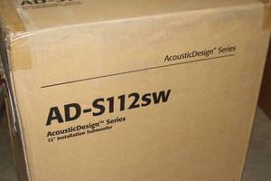 lot 54 image: QSC AD-S112SW Acoustic Design 12 Surface Mount Pro Audio Sub Woofer Subwoofer Bass Unit - NEW IN BOX  $700 Online