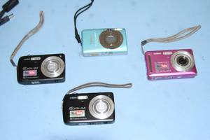 lot 102 image: Lot of 4 - Casio ELIXIM Digital Video Cameras and Accessories