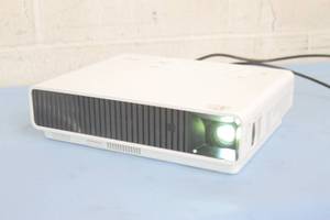 lot 103 image: Casio Signature Series Laser Light Source HD DLP 3D Ready Home Theater  Conference Projector - Projection System