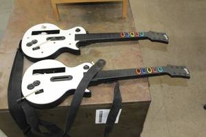 lot 468 image: Lot of (2) Guitar Hero Gaming Guitars
