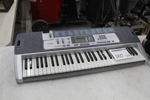 lot 507 image: Casio LK-100 Key Lighting System Electric Keyboard