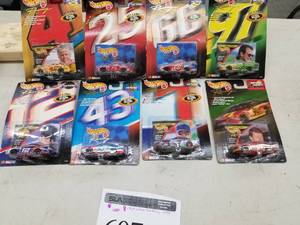 lot 607 image: Lot of (8) Hot Wheels Pro Racing 1999 NASCAR Stock Car 164 Scale Die-Cast Metal Replica Adult Collectible (In Original Packaging)