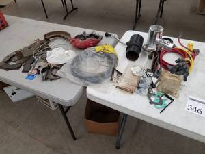 lot 546 image: Automotive Parts - Brake Pads, Exhaust Brackets, Caliper, B&M Shifter, MSD Ignition Wire Set, Misc. Parts