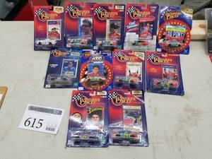 lot 615 image: Lot of (12) Hasbro Winners Circle Jeff Gordon #24 NASCAR Stock Car 164 Scale Die-Cast Metal Replica Adult Collectible (In Original Packaging)