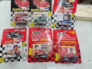 lot 617 image: Lot of (6) Racing Champions Race Car 164 Scale Die-Cast Metal Replica Adult Collectible (In Original Packaging)
