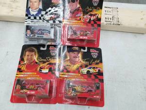 lot 619 image: Lot of (4) Racing Champions Signature Drivers Series NASCAR Stock Car 164 Scale Die-Cast Metal Replica Adult Collectible (In Original Packaging)