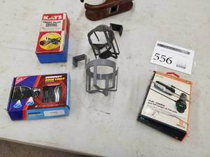 lot 556 image: Automotive Accessories - Courtesy Door Light, Kats Frost Plug Engine Heater, Griffin MP3 Player, Cup Holders