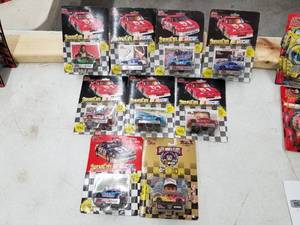 lot 625 image: Lot of (9) Racing Champions NASCAR Stock Car 164 Scale Die-Cast Metal Replica Adult Collectible (In Original Packaging)
