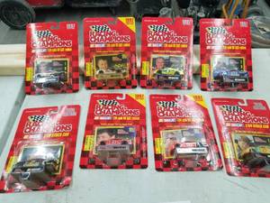 lot 633 image: Lot of (8) Racing Champions NASCAR Stock Car 164 Scale Die-Cast Metal Replica Adult Collectible (In Original Packaging)