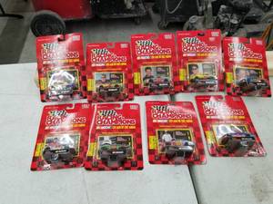 lot 634 image: Lot of (9) Racing Champions 1997 Edition NASCAR Stock Car 164 Scale Die-Cast Metal Replica Adult Collectible (In Original Packaging)
