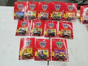 lot 636 image: Lot of (12) Racing Champions 50th Anniversary NASCAR Stock Car 164 Scale Die-Cast Metal Replica Adult Collectible (In Original Packaging)