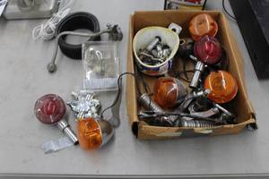 lot 649 image: Lot of  Motorcycle Parts - Brake Lamps, Turn Lamps, Brake Line, Misc. Parts
