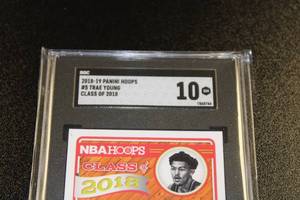 lot 1 image: 2018-19 Hoops Class of 2018 Trae Young Rookie Card SGC 10