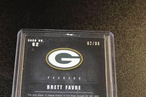 lot 3 image: 2012 Black Brett Favre NFL Equipment Relic #62 6299  Only 99 Exist