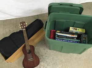 lot 27 image: Bin of Fun Ukelele, Puzzles, Books