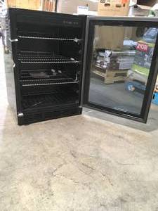 Magic Chef Wine and Beverage Center turns on does not get very cold customer return see pictures