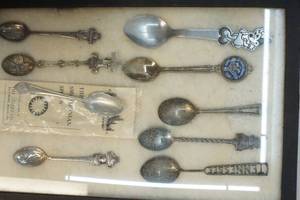 lot 16 image: postcards and spoons