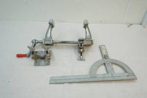 lot 194 image: Clamp and protractor