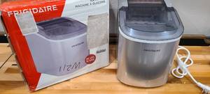lot 119 image: Frigidaire Ice Machine