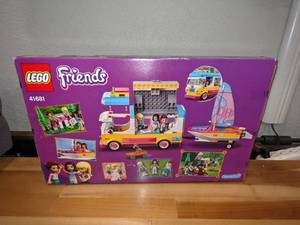 lot 62 image: LEGO Friends Forest Camper Van and Sailboat 41681 Building Kit