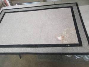 47 x 30 rubber floor mat with a sta...