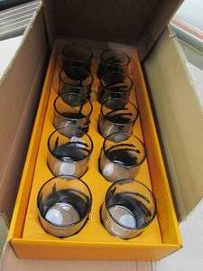 case of skull hand whiskey glasses ...