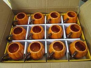 12 pumpkin mugs ...