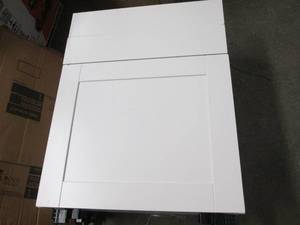 white cabinet with 2 drawers and a ...