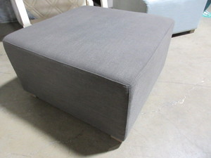 lot 706 image: UPHOLSTERED OTTOMAN BY VILLA FOR HOM FURNITURE