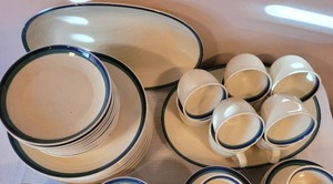 lot 136 image: Full Pfaltzgraff Dish Set with Serving and Extra Pieces
