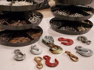 lot 295 image: (2) Rotating Hardware Bins and I Hooks Lot