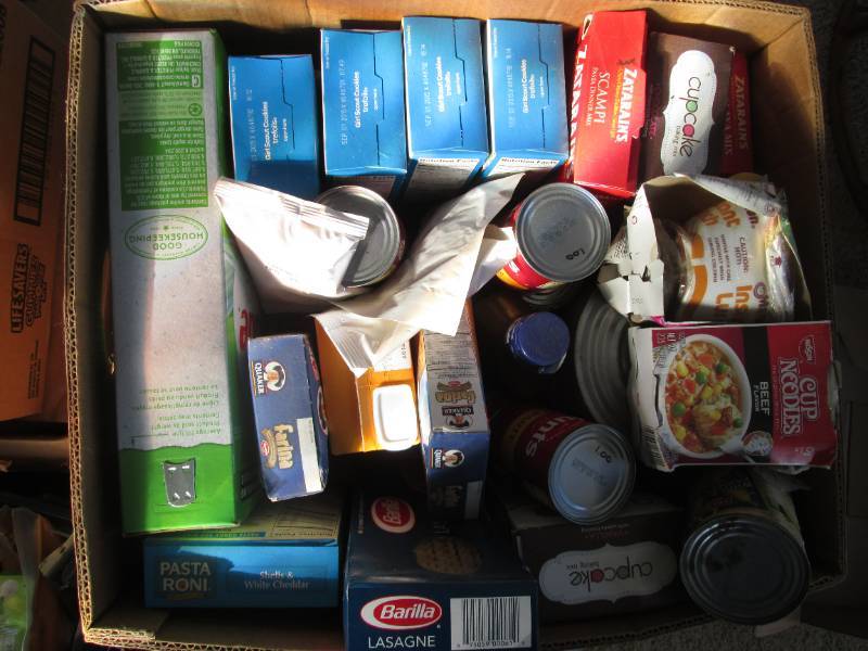 Box of non perishable food and dish...