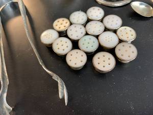 lot 234 image: Antique Salt and Pepper Lids and other tabletop items