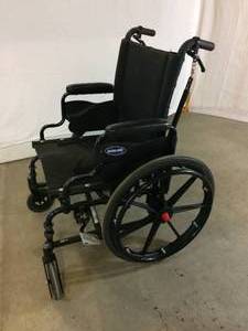 lot 1 image: MSRP $1500 Invacare 9000 XT High Performance Lighter Weight Wheelchair (Collapsible) With Special Seated Brake Release Movement & Attendant Hand Braking Control - Excellent Condition 