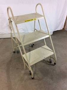 lot 9 image: MSRP $300 Cramer 3-Step Warehouse Mobile & Folding Ladder (Biege) WRETRACTING CASTERS 300lb Capacity&nbspScratch resistant powder coated finish - Great Condition