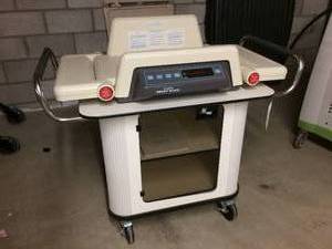 lot 60 image: MSRP $2200 Natus Pediatrics Veterinarian Olympic Smart Scale With Glass Door Mobile Cabinet Cart - Excellent Working Condition