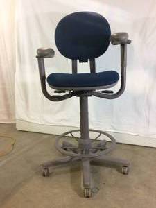 lot 16 image: MSRP $1500 (Oh My) Steelcase TB117 High Quality Multi-Adjustable Medical Stool Chair WAdjustable Arms (Pads Adjust InOut), Height, Back (UpDown InOut), Seat Angle & More - Excellent Condition - Only Flaw 1 Arm Pad Is Starting To Split 
