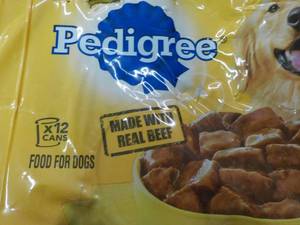 11 Cans Dog Food and Bag of DogChew...